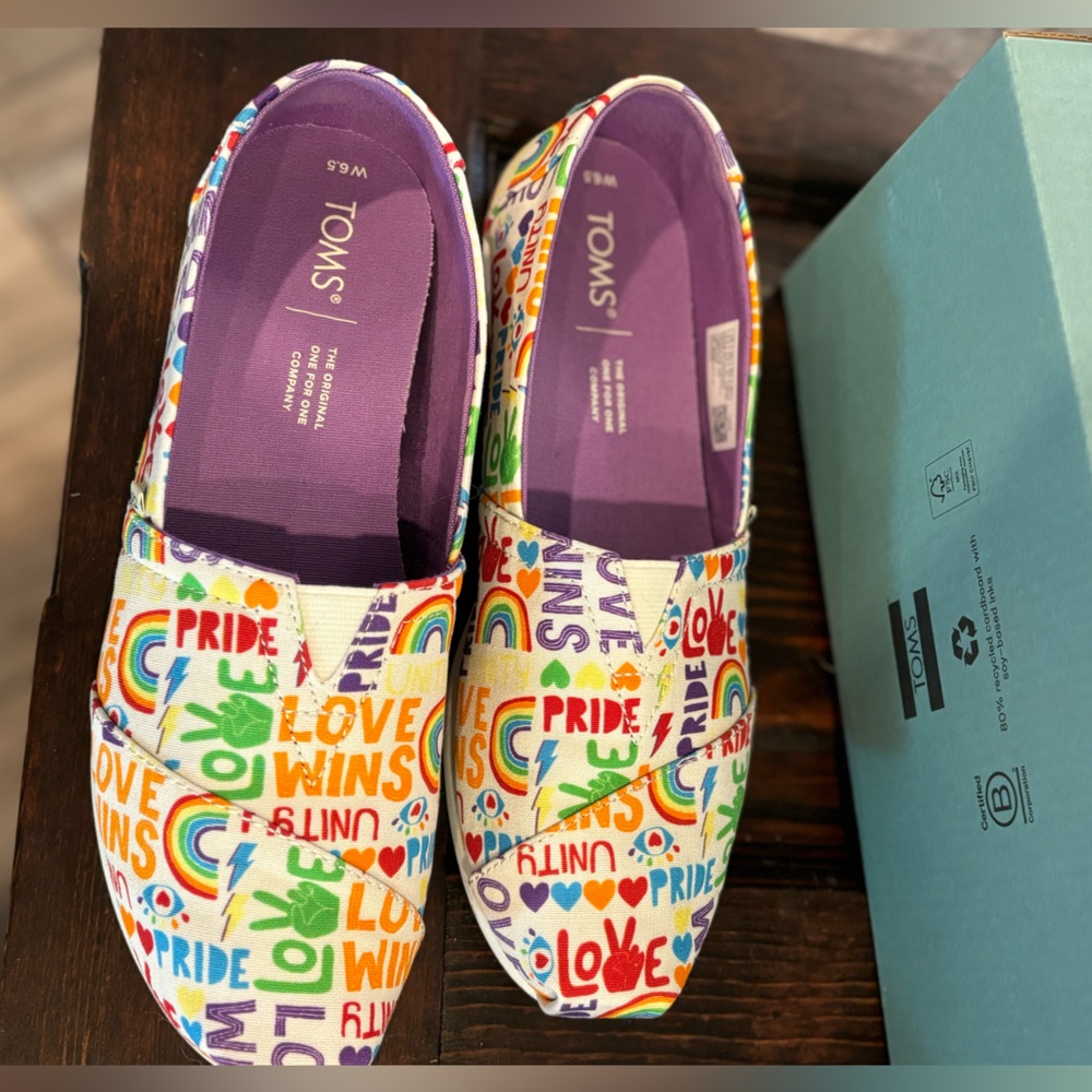 Love wins pride slip ons